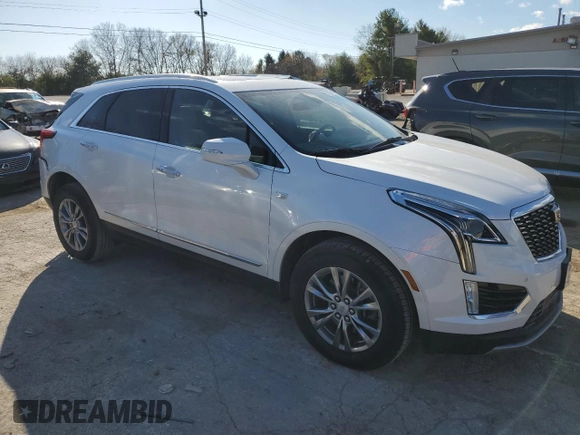 2023 Cadillac XT5 AWD Premium Luxury with VIN 1GYKNDR44PZ196239, listed as a Copart auction lot 79122674 with 20,226 mi miles and Salvage Title. Bid and sale history available at DreamBid. Image 4.