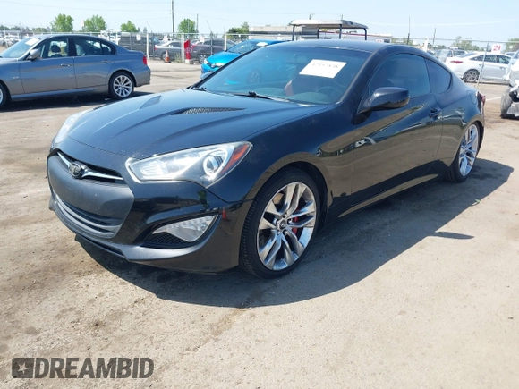 2013 Hyundai Genesis Coupe Track z VIN KMHHU6KJXDU113335, wystawiony jako IAAI lot #42157838 z przebiegiem 128 366 mil mil oraz . Historia ofert i sprzedaży dostępna na DreamBid. Obrazek 2.