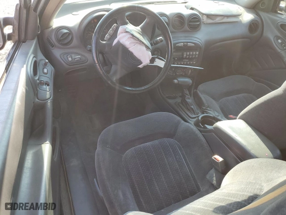2001 Pontiac Grand Am GT with VIN 1G2NW12E31M584119, listed as a Copart auction lot 76099984 with 293,559 mi miles and Clean Title. Bid and sale history available at carsss.com. Image 8.