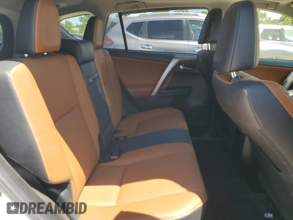 2016 Toyota RAV4 Limited with VIN JTMDJREV8GD009622, listed as a Copart auction lot 61870645 with 110,515 mi miles and Salvage title. Bid and sale history available at DreamBid. Image 11.
