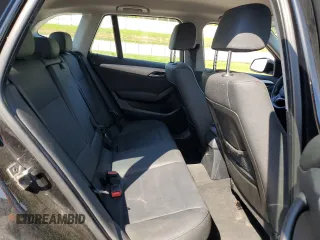 2014 BMW X1 xDrive28i z VIN WBAVL1C5XEVY13900, wystawiony jako Copart lot #56472225 z przebiegiem Nie podano mil oraz Szkoda całkowita • Salvage title. Historia ofert i sprzedaży dostępna na DreamBid. Obrazek 11.