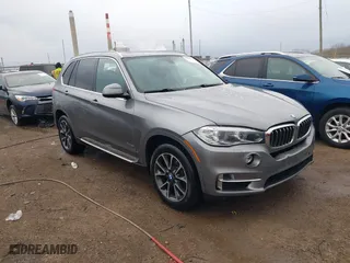2017 BMW X5 xDrive35i with VIN 5UXKR0C38H0V83559, listed as a IAAI auction lot 41860595 with 92,037 mi miles. Bid and sale history available at carsss.com. Image 1.