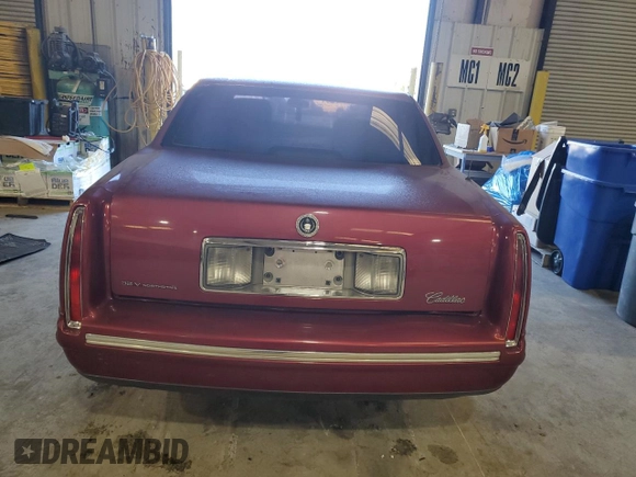 1998 Cadillac DeVille with VIN 1G6KD54YXWU719609, listed as a Copart auction lot 83112704 with 154,627 mi miles and Salvage Title. Bid and sale history available at carsss.com. Image 6.