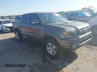 2013 Toyota Tacoma PreRunner z VIN 5TFJU4GN3DX040992, wystawiony jako IAAI lot #42022841 z przebiegiem 159 474 mil mil oraz . Historia ofert i sprzedaży dostępna na DreamBid. Obrazek 1.