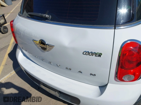 2015 MINI Countryman with VIN WMWZB3C51FWR45357, listed as a IAAI auction lot 41871831 with 201,358 mi miles and . Bid and sale history available at DreamBid. Image 6.