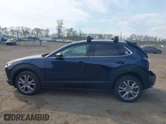 2021 Mazda CX-30 Premium with VIN 3MVDMBDM4MM238367, listed as a IAAI auction lot 42124335 with 31,120 mi miles and . Bid and sale history available at DreamBid. Image 14.
