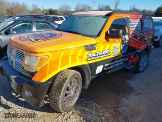 2011 Dodge Nitro SXT with VIN 1D4PU5GK9BW535743, listed as a IAAI auction lot 41200573 with 155,239 mi miles. Bid and sale history available at carsss.com. Image 2.