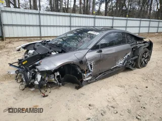 2015 BMW i8 z VIN WBY2Z2C52FV391003, wystawiony jako Copart lot #49772875 z przebiegiem Nie podano mil oraz Szkody całkowita. Historia ofert i sprzedaży dostępna na DreamBid. Obrazek 1.