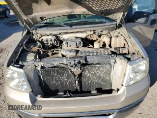 2007 Ford F-150 XL with VIN 1FTRF14V47KC19429, listed as a Copart auction lot 80147594 with 101,749 mi miles and Salvage title. Bid and sale history available at DreamBid. Image 12.