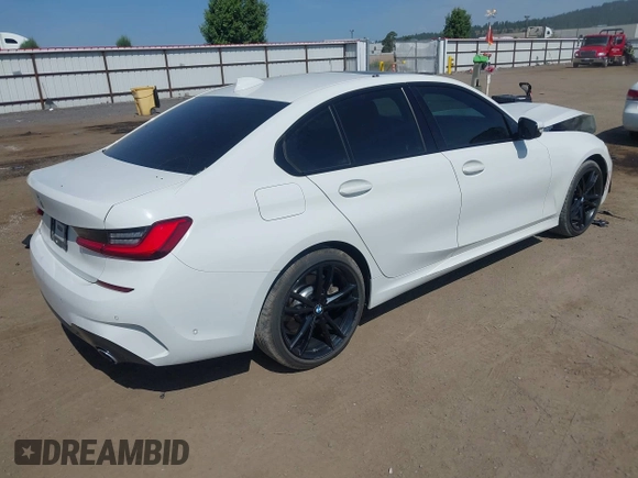 2019 BMW 3 Series 330i xDrive with VIN WBA5R7C52KAJ82760, listed as a IAAI auction lot 42485304 with 43,298 mi miles and . Bid and sale history available at DreamBid. Image 4.