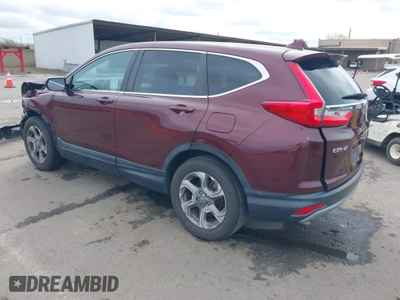 2019 Honda CR-V EX with VIN 7FARW2H56KE053022, listed as a IAAI auction lot 41848570 with 128,676 mi miles. Bid and sale history available at carsss.com. Image 3.