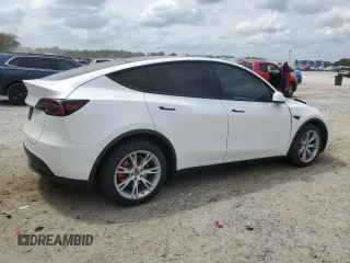 2021 Tesla Model Y Long Range with VIN 5YJYGDEE5MF203130, listed as a Copart auction lot 54642795 with 73,663 mi miles and Non Repairable. Bid and sale history available at DreamBid. Image 3.