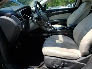 2016 Ford Fusion Titanium с VIN 3FA6P0K93GR117637, выставлен на аукционе Copart как лот 59928825 с пробегом 120 561 миль миль и Списание • Salvage title. История ставок и продаж доступна на DreamBid. Изображение 7.