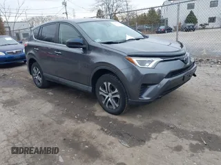 2018 Toyota RAV4 LE with VIN JTMBFREV1JJ215401, listed as a IAAI auction lot 41669313 with 72,314 mi miles. Bid and sale history available at carsss.com. Image 1.