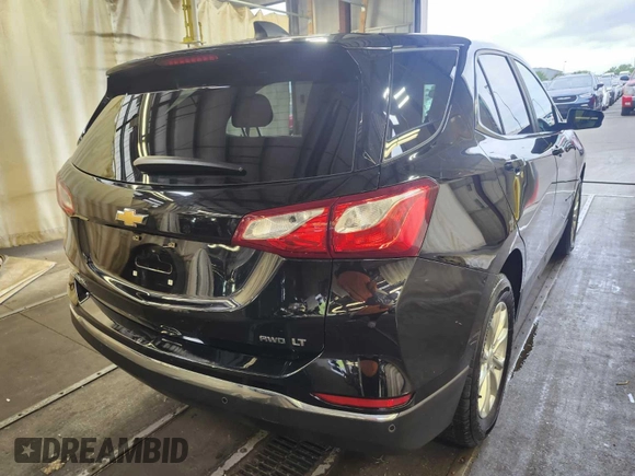 2021 Chevrolet Equinox LT with VIN 2GNAXTEV2M6111837, listed as a IAAI auction lot 42240497 with 65,232 mi miles and . Bid and sale history available at DreamBid. Image 3.