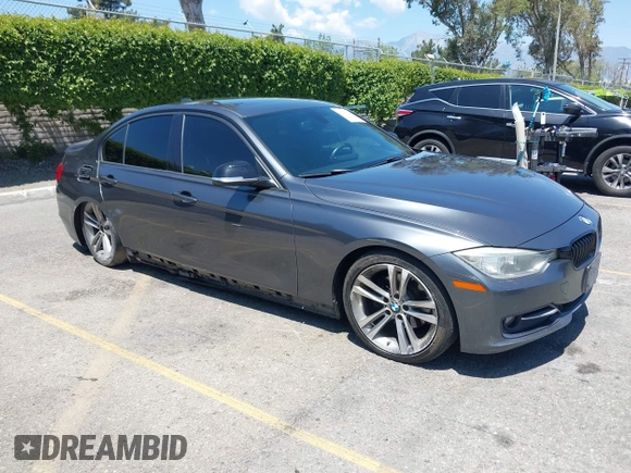 2014 BMW 3 Series 328d with VIN WBA3D3C51EK155031, listed as a IAAI auction lot 42149784 with 204,521 mi miles and . Bid and sale history available at carsss.com. Image 1.