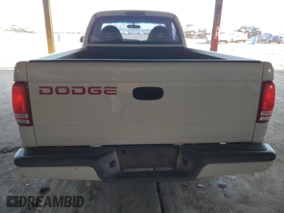 1999 Dodge Dakota SLT with VIN 1B7FL26X6XS180827, listed as a Copart auction lot 85789944 with 85,166 mi miles and Salvage Title. Bid and sale history available at carsss.com. Image 6.