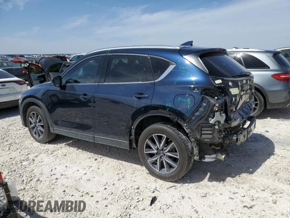2018 Mazda CX-5 Grand Touring with VIN JM3KFBDM8J0474819, listed as a Copart auction lot 48580545 with 76,917 mi miles and Salvage Title. Bid and sale history available at DreamBid. Image 2.