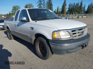 2000 Ford F-150 XL with VIN 1FTRX17W4YKA47244, listed as a IAAI auction lot 42076893 with 362,114 mi miles. Bid and sale history available at carsss.com. Image 1.