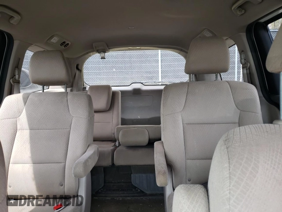 2014 Honda Odyssey LX with VIN 5FNRL5H27EB116435, listed as a Copart auction lot 52864825 with 94,643 mi miles and Salvage Title. Bid and sale history available at DreamBid. Image 10.