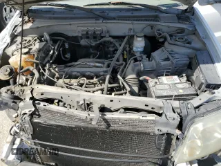 2005 Mercury Mariner Convenience с VIN 4M2YU56Z65DJ16579, выставлен на аукционе Copart как лот 48474465 с пробегом Не указан миль и На запчасти • Non repairable. История ставок и продаж доступна на DreamBid. Изображение 12.