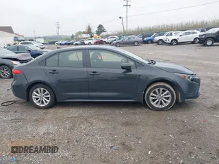 2023 Toyota Corolla LE with VIN JTDB4MEE8P3003083, listed as a IAAI auction lot 42007618 with 85,858 mi miles and . Bid and sale history available at DreamBid. Image 13.
