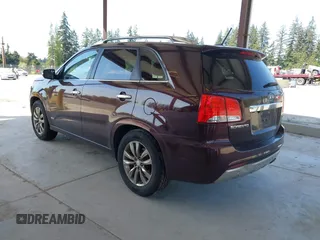 2011 Kia Sorento SX with VIN 5XYKWDA23BG120760, listed as a IAAI auction lot 42111403 with 119,666 mi miles. Bid and sale history available at carsss.com. Image 3.
