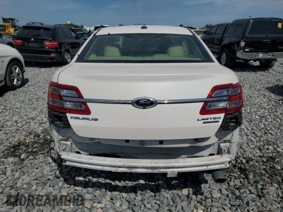 2016 Ford Taurus Limited with VIN 1FAHP2F85GG140107, listed as a Copart auction lot 66093895 with 72,614 mi miles and Salvage title. Bid and sale history available at DreamBid. Image 6.