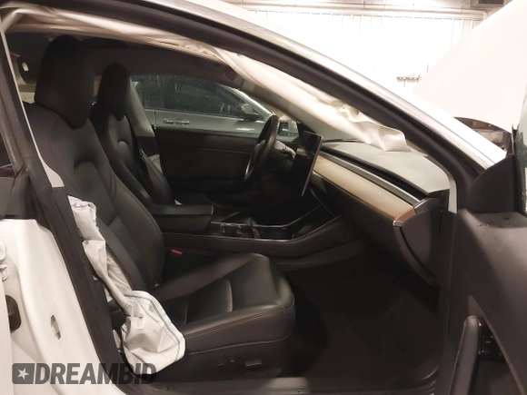 2018 Tesla Model 3 Long Range Battery with VIN 5YJ3E1EB5JF084446, listed as a IAAI auction lot 41209852 with 70,125 mi miles and . Bid and sale history available at DreamBid. Image 5.