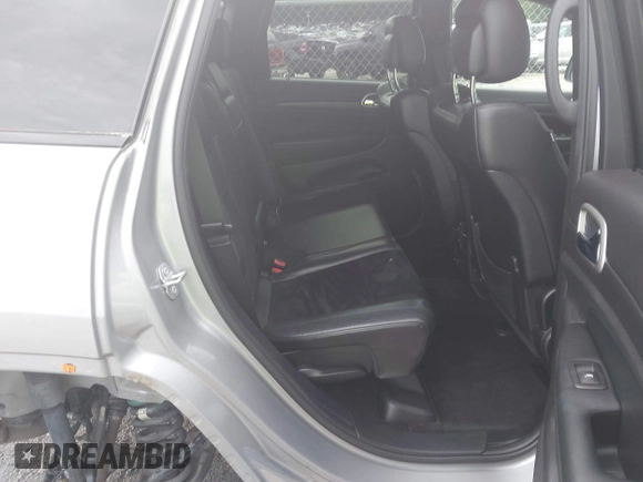 2018 Jeep Grand Cherokee Laredo E z VIN 1C4RJEAG5JC404022, wystawiony jako IAAI lot #42586412 z przebiegiem 95 798 mil mil oraz . Historia ofert i sprzedaży dostępna na DreamBid. Obrazek 8.