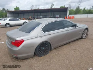 2009 BMW 7 Series 750Li with VIN WBAKB83559CY59747, listed as a IAAI auction lot 41811372 with 135,193 mi miles. Bid and sale history available at carsss.com. Image 4.