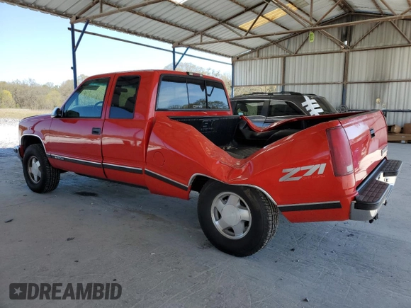 1997 Chevrolet Silverado 1500 with VIN 1GCEK19R1VE137711, listed as a Copart auction lot 50542465 with 297,338 mi miles and Salvage Title. Bid and sale history available at DreamBid. Image 2.