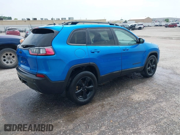 2020 Jeep Cherokee Altitude with VIN 1C4PJMLX7LD524514, listed as a IAAI auction lot 42398590 with 167,686 mi miles and . Bid and sale history available at DreamBid. Image 4.