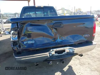 1999 Ford F-150 XL with VIN 1FTRX17L4XKA58054, listed as a IAAI auction lot 41647530 with 225,632 mi miles. Bid and sale history available at carsss.com. Image 6.