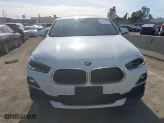 2020 BMW X2 sDrive28i with VIN WBXYH9C01L5P15004, listed as a IAAI auction lot 41128060 with 86,052 mi miles. Bid and sale history available at carsss.com. Image 11.