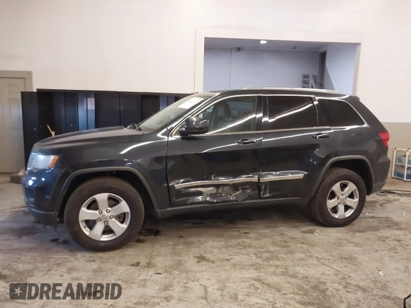 2012 Jeep Grand Cherokee Laredo with VIN 1C4RJFAG5CC351539, listed as a IAAI auction lot 41861533 with 166,909 mi miles. Bid and sale history available at carsss.com. Image 14.