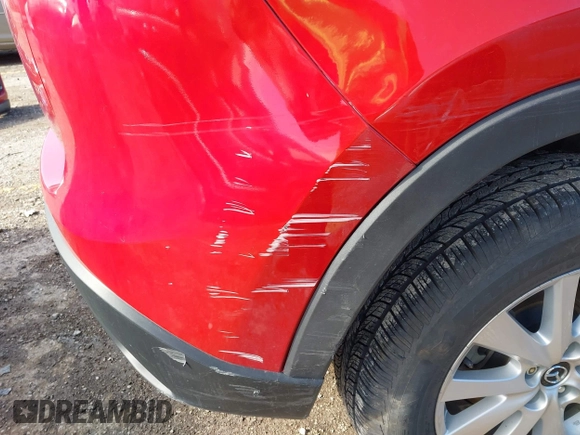 2016 Mazda CX-5 Touring with VIN JM3KE4CY5G0630438, listed as a IAAI auction lot 41877660 with 56,960 mi miles. Bid and sale history available at carsss.com. Image 19.