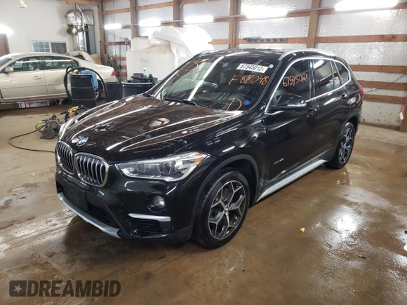 2017 BMW X1 xDrive28i with VIN WBXHT3C34H5F87048, listed as a Copart auction lot 67545012 with 76,666 mi miles. Bid and sale history available at carsss.com. Image 1.