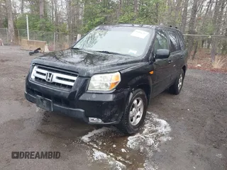 2006 Honda Pilot EX-L with VIN 5FNYF18776B021690, listed as a IAAI auction lot 42016219 with 239,666 mi miles and . Bid and sale history available at DreamBid. Image 2.