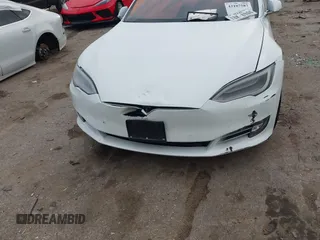 2016 Tesla Model S 70 with VIN 5YJSA1E12GF172359, listed as a IAAI auction lot 42107587 with Not provided miles and . Bid and sale history available at DreamBid. Image 10.