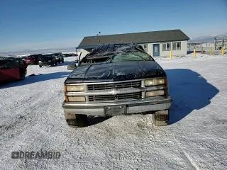 1996 Chevrolet Suburban z VIN 1GNFK16R0TJ417592, wystawiony jako Copart lot #42424015 z przebiegiem 238 536 mil mil oraz Czysty tytuł • Clean title. Historia ofert i sprzedaży dostępna na DreamBid. Obrazek 12.