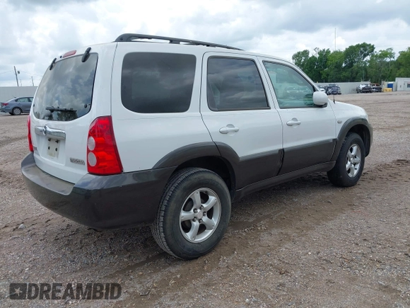 2006 Mazda Tribute i with VIN 4F2YZ02Z56KM31953, listed as a IAAI auction lot 42167223 with 185,169 mi miles and . Bid and sale history available at carsss.com. Image 4.