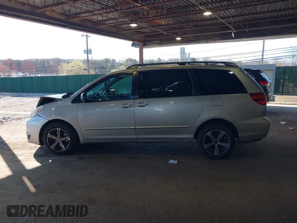 2005 Toyota Sienna LE with VIN 5TDBA23C75S046310, listed as a IAAI auction lot 42063973 with 127,509 mi miles. Bid and sale history available at carsss.com. Image 14.