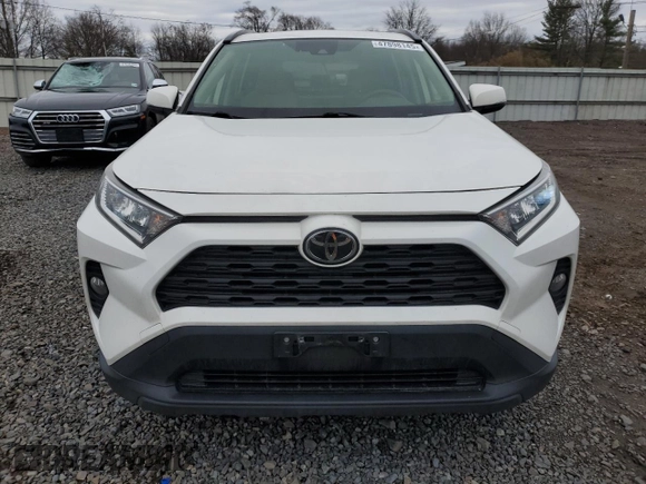 2019 Toyota RAV4 XLE with VIN JTMP1RFV9KD506344, listed as a Copart auction lot 47898145 with 100,718 mi miles and Salvage Title. Bid and sale history available at DreamBid. Image 5.