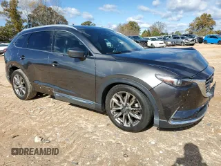 2017 Mazda CX-9 Grand Touring z VIN JM3TCADY8H0138866, wystawiony jako Copart lot #80894184 z przebiegiem Nie podano mil oraz Szkoda całkowita • Salvage title. Historia ofert i sprzedaży dostępna na DreamBid. Obrazek 4.