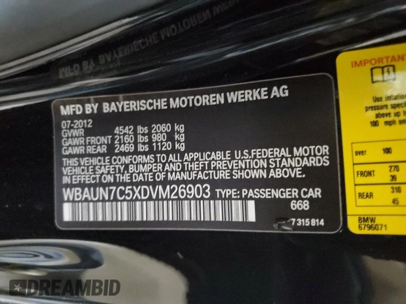 2013 BMW 1 Series 135i with VIN WBAUN7C5XDVM26903, listed as a Copart auction lot 60525595 with 219,810 mi miles and Salvage title. Bid and sale history available at DreamBid. Image 12.