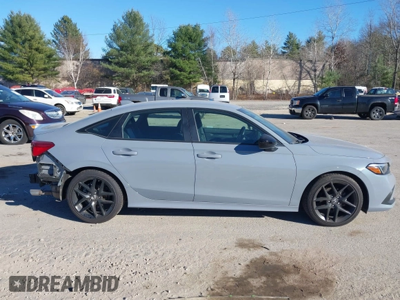 2022 Honda Civic Sport z VIN 2HGFE2F50NH601567, wystawiony jako IAAI lot #40880687 z przebiegiem 16 587 mil mil oraz . Historia ofert i sprzedaży dostępna na DreamBid. Obrazek 14.