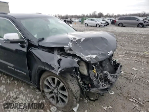 2018 Jeep Grand Cherokee Overland z VIN 1C4RJFCT7JC435403, wystawiony jako Copart lot #86568024 z przebiegiem 105 681 mil mil oraz Szkoda całkowita • Salvage title. Historia ofert i sprzedaży dostępna na DreamBid. Obrazek 11.