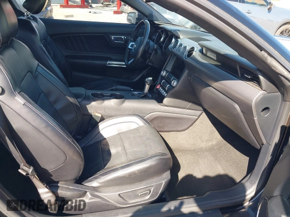 2015 Ford Mustang EcoBoost z VIN 1FA6P8TH9F5355840, wystawiony jako IAAI lot #42552910 z przebiegiem 96 422 mil mil oraz . Historia ofert i sprzedaży dostępna na DreamBid. Obrazek 5.