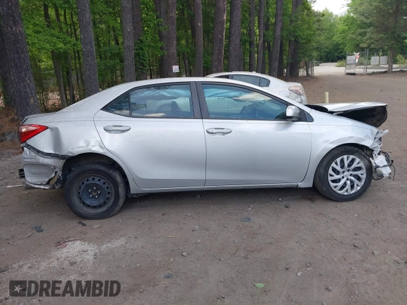2018 Toyota Corolla L z VIN 5YFBURHE7JP812470, wystawiony jako IAAI lot #42183208 z przebiegiem 243 880 mil mil oraz . Historia ofert i sprzedaży dostępna na DreamBid. Obrazek 13.